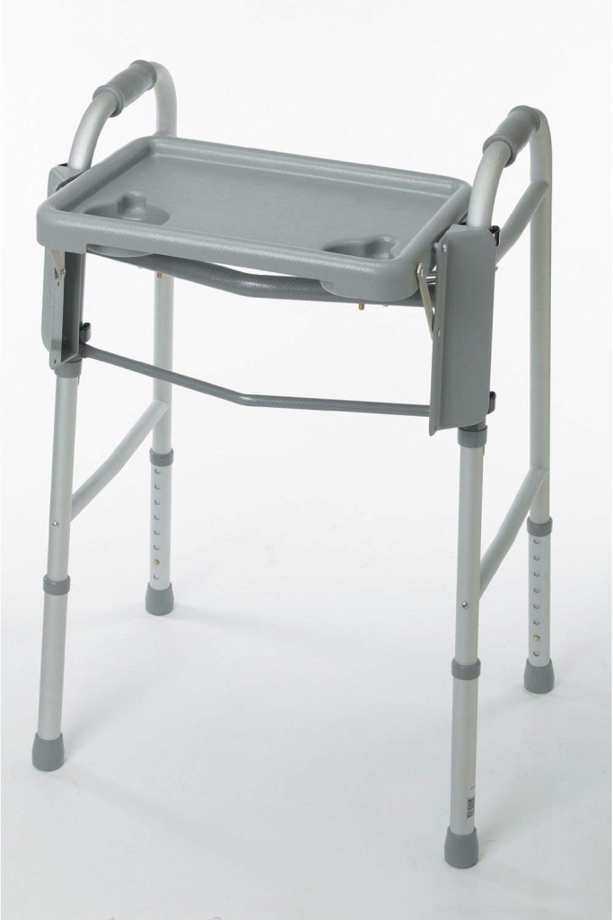 Gray plastic walker tray attached to folding walker frame