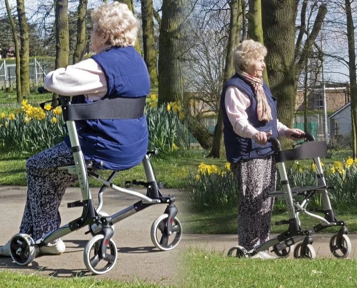 Two senior women using upright walkers outdoors